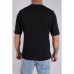 Gestricktes T-Shirt mit dekorativen Löchern – schwarz