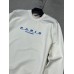 Sweatshirt mit buntem Aufdruck - creme