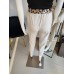 Viscose trousers with ruffles - beige