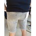 Jeansshorts mit Abschürfungen – grau