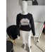 Double thread embroidered blouse with sequined lips - black