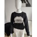 Double thread embroidered blouse with sequined lips - black